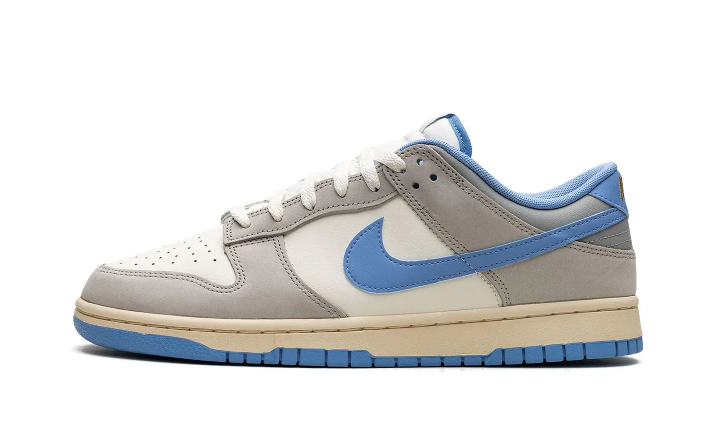 NIKE Dunk Low
"Athletic Department - University Blue" Shoe Flyes